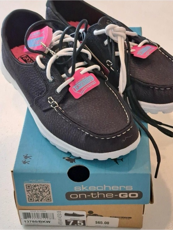 Skechers Shoes - Skechers Black and White Boat-Style Sneakers